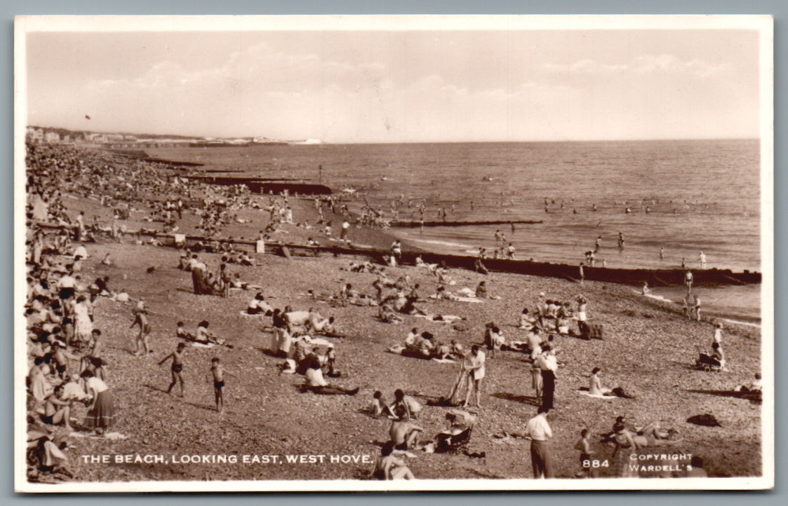 This is a West Hove, The Beach looking East, Sussex Vintage Topographical Postcard