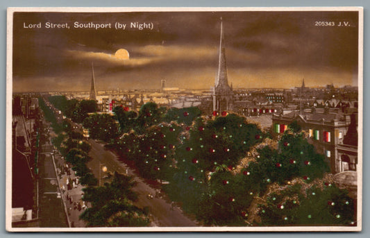 This is a Vintage Topographical Postcard showing Southport Lord Street By Night Merseyside