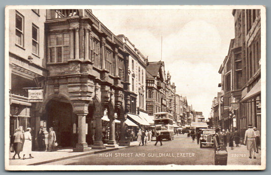 This is a Vintage Topographical Postcard showing Exeter High Street Guildhall Devon