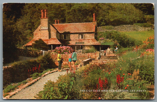 This is a Vintage Topographical Postcard showing Lynmouth Lee Abbey Cottage and Tea Garden