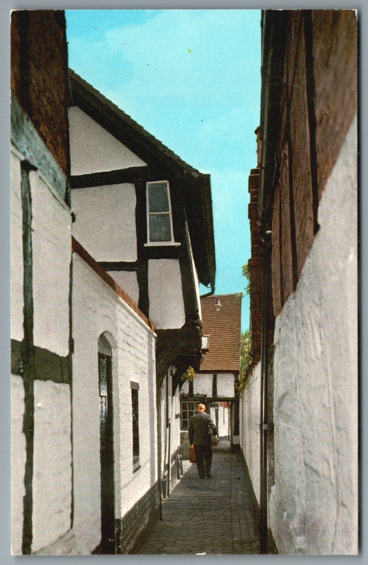 This is a Vintage Topographical Postcard showing Tewkesbury Lilley's Alley Gloucestershire