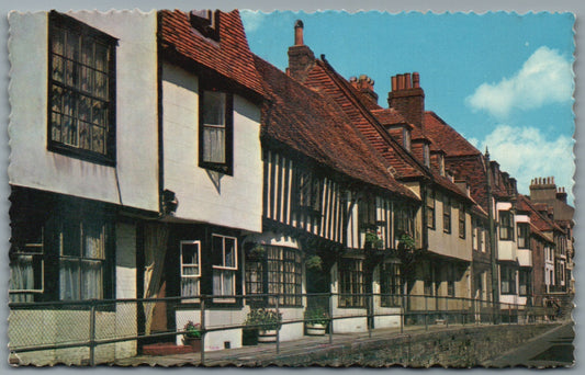 This is a Vintage Topographical Postcard showing Hastings High Street Sussex